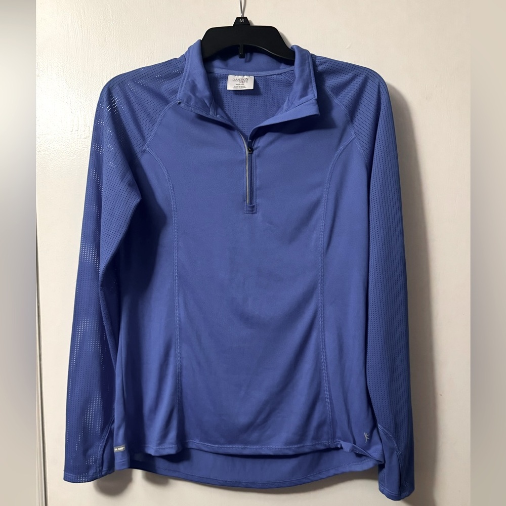 Danskin women’s zipper/pullover jacket in a size medium.